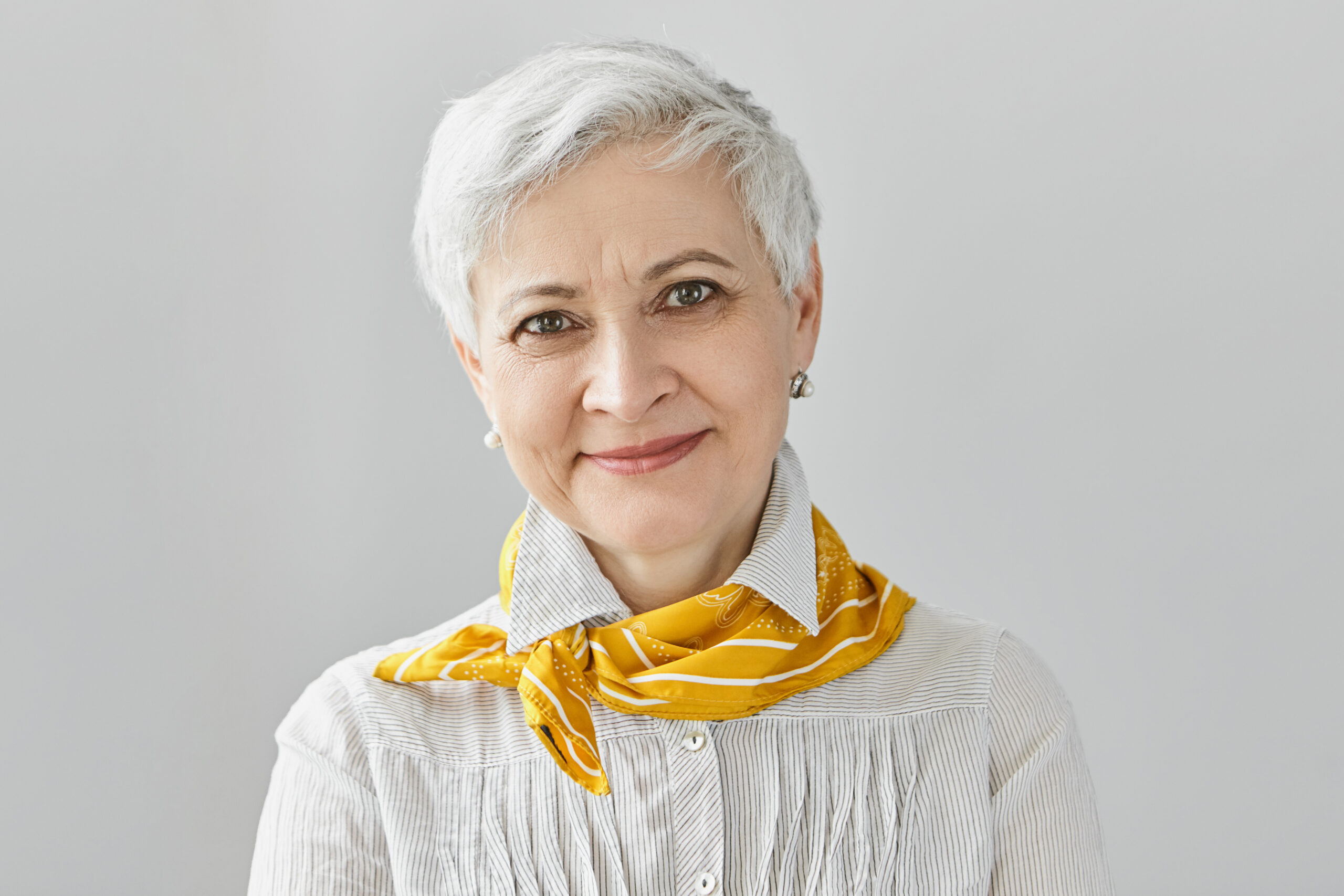 beauty, style, fashion and aging concept. charming elegant gray